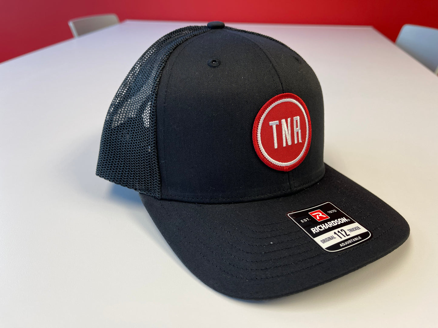 Next Round TNR Alternate Logo Trucker Hat (Black/Black)