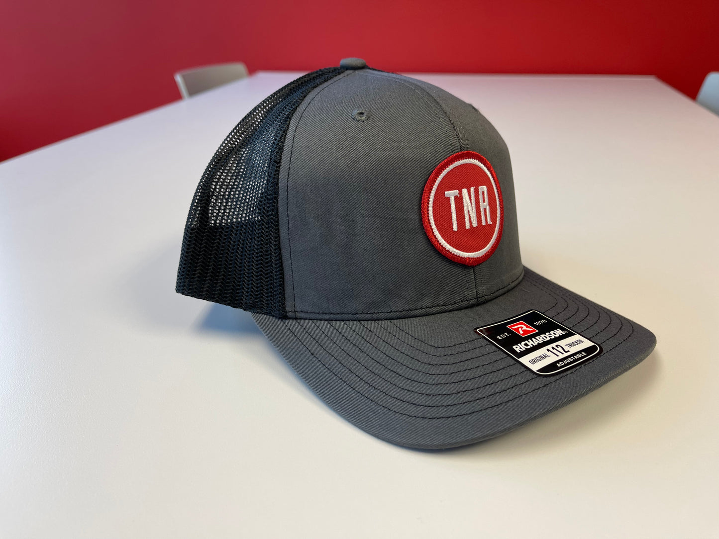 Next Round TNR Alternate Logo Trucker Hat (Gray/Black)
