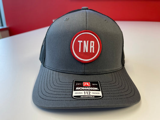 Next Round TNR Alternate Logo Trucker Hat (Gray/Black)
