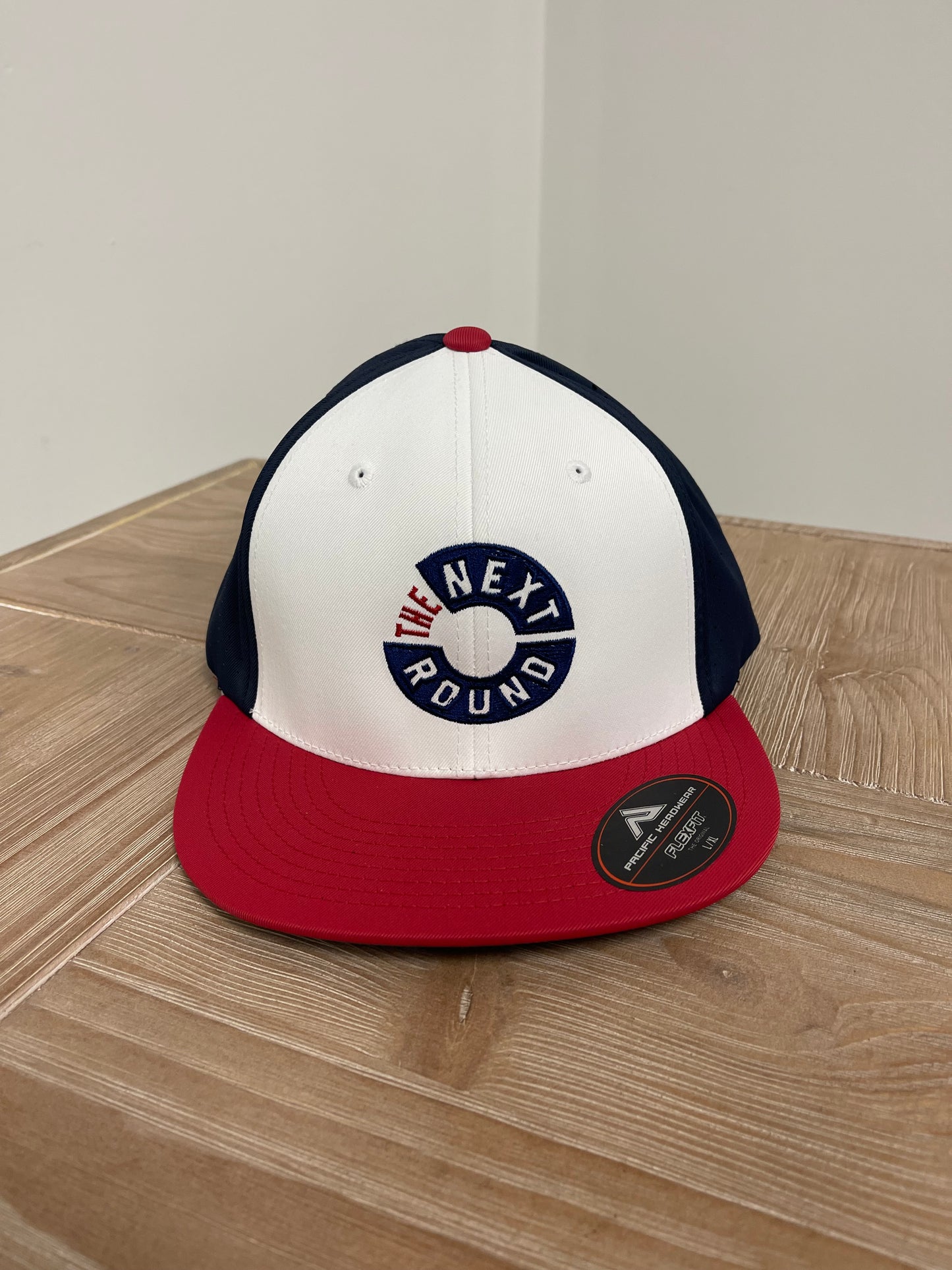 The Next Round Pacific FlexFit Logo Hat (Red/White/Navy)
