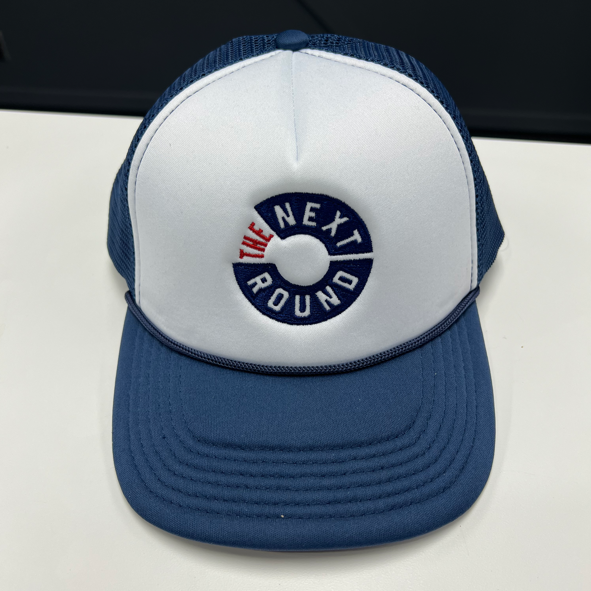 Next Round Logo Foam Trucker Hat Blue White Next Round Live