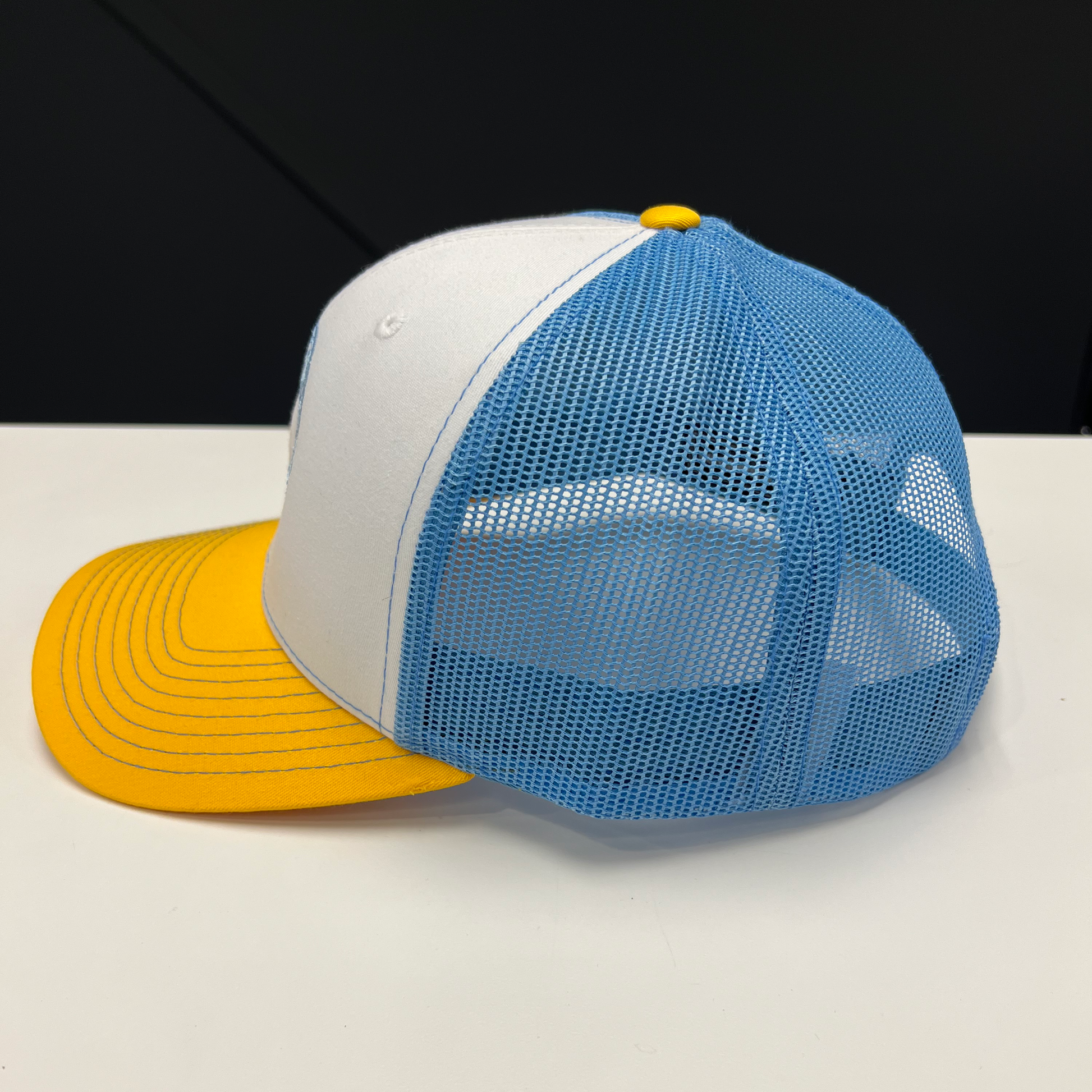 Next Round Logo Trucker Hat Yellow Light Blue White Next Round