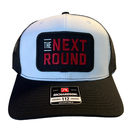 Next Round Patch Trucker Hat (White/Black)