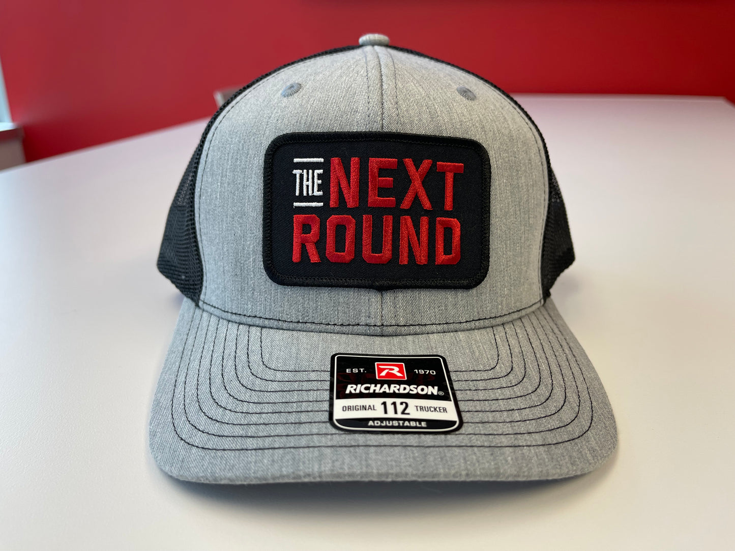 Next Round Patch Trucker Hat (Gray/Black)