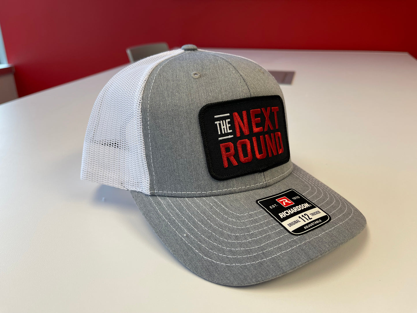 Next Round Patch Trucker Hat (Gray/White)