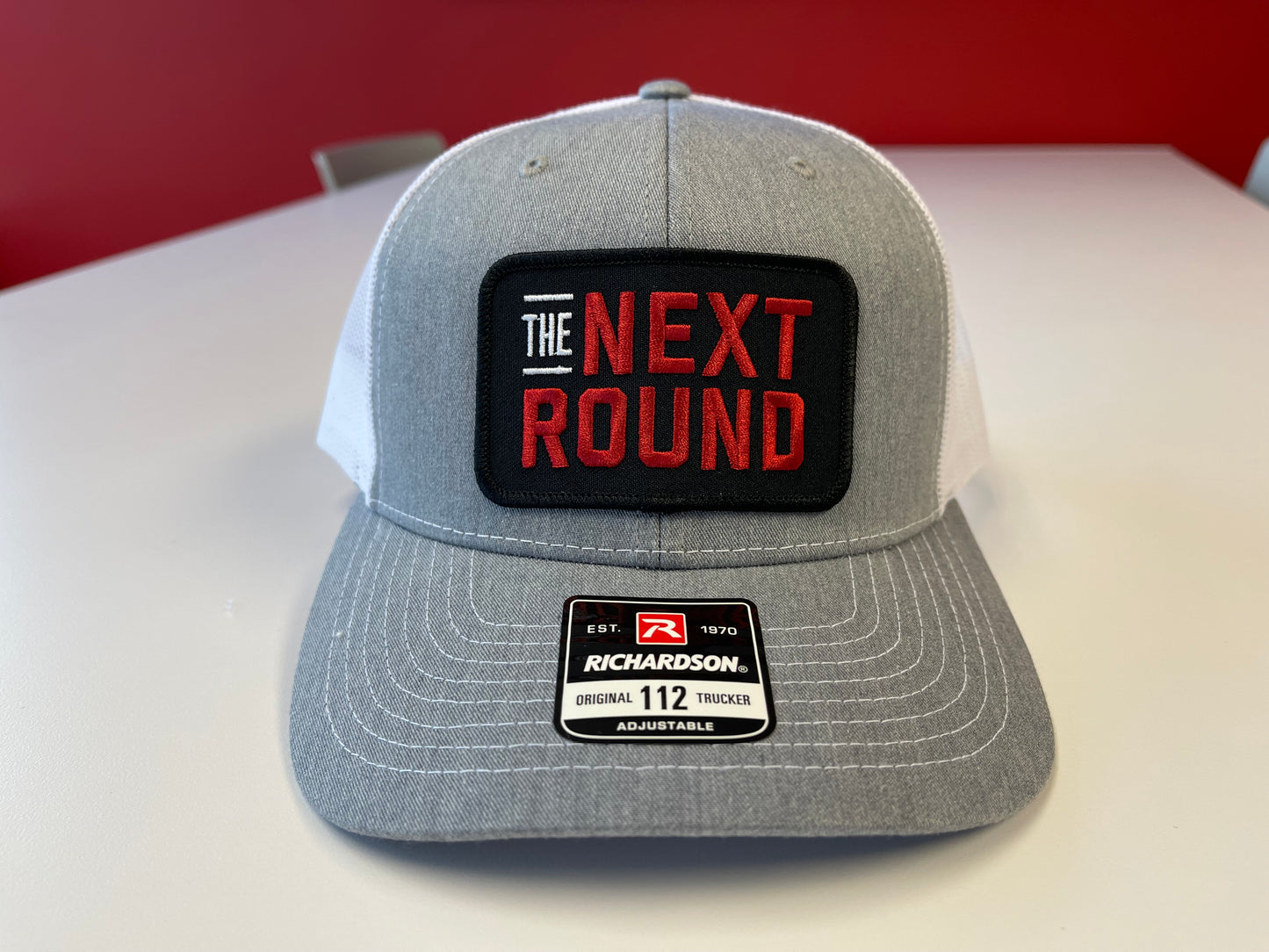 Next Round Patch Trucker Hat (Gray/White)
