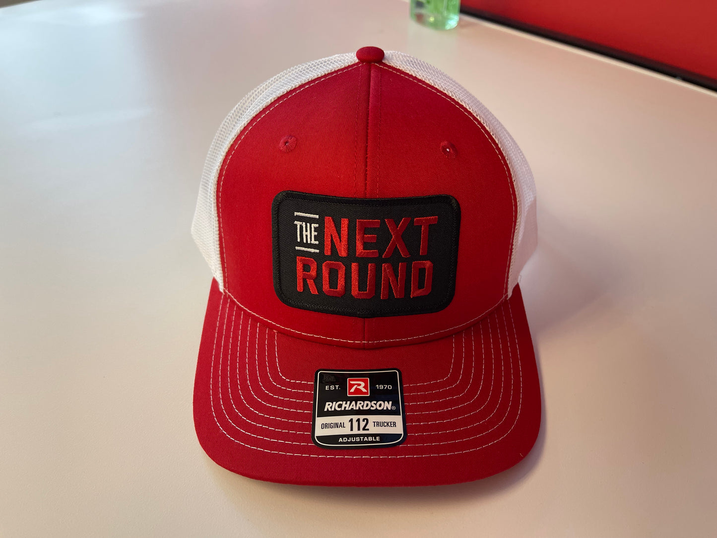 Next Round Patch Trucker Hat (Red/White)