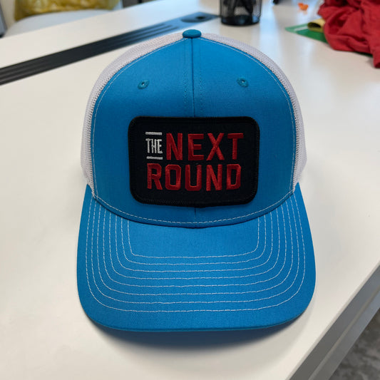 Next Round Patch Trucker Hat (Blue/White)